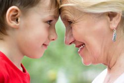 stock-photo-grandmother-with-grandson-on-nature-face-to-face-70192498